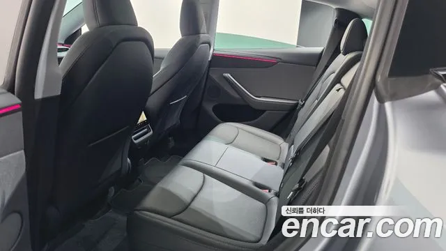Tesla Model Y — Фото автомобиля 5