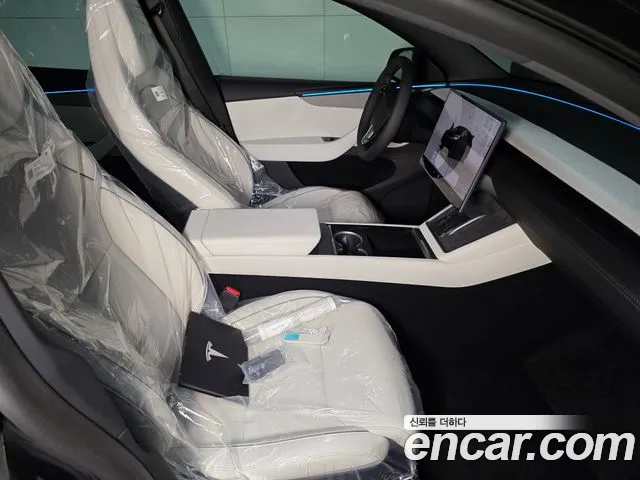 Tesla Model Y — Фото автомобиля 6