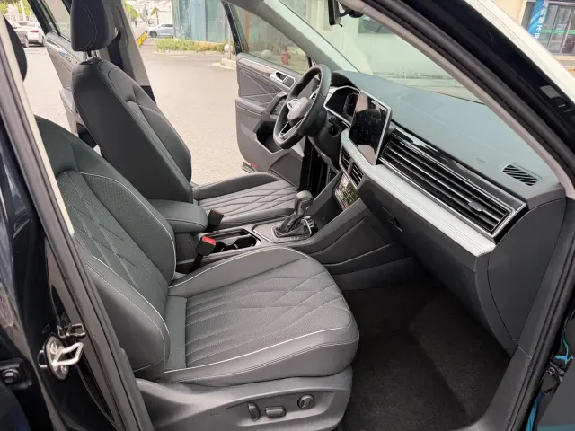 Volkswagen Tiguan L — Фото автомобиля 13