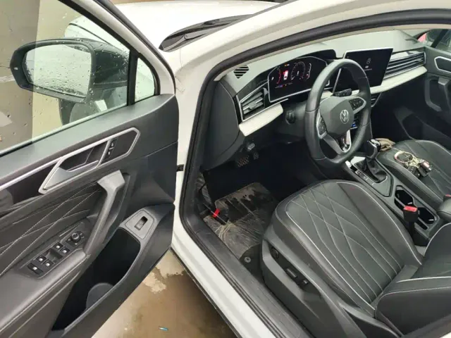 Volkswagen Tiguan L — Фото автомобиля 15
