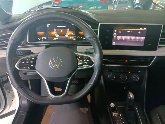 Volkswagen Tiguan L — Фото автомобиля 9