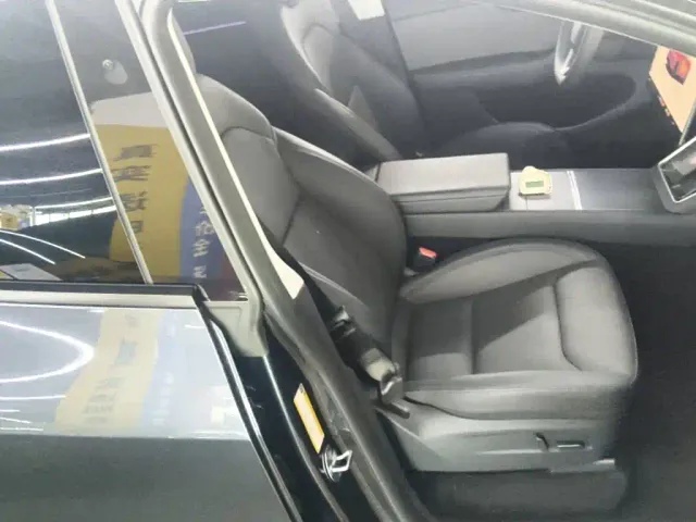 Tesla Model Y — Фото автомобиля 24