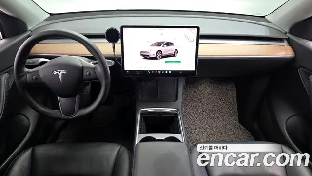 Tesla Model Y — Фото автомобиля 7