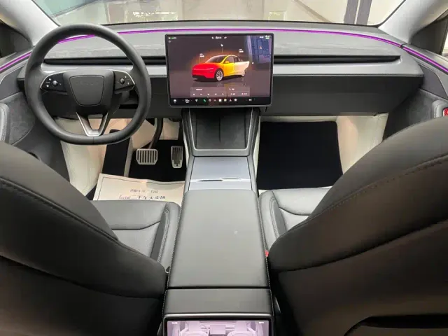 Tesla Model Y — Фото автомобиля 13