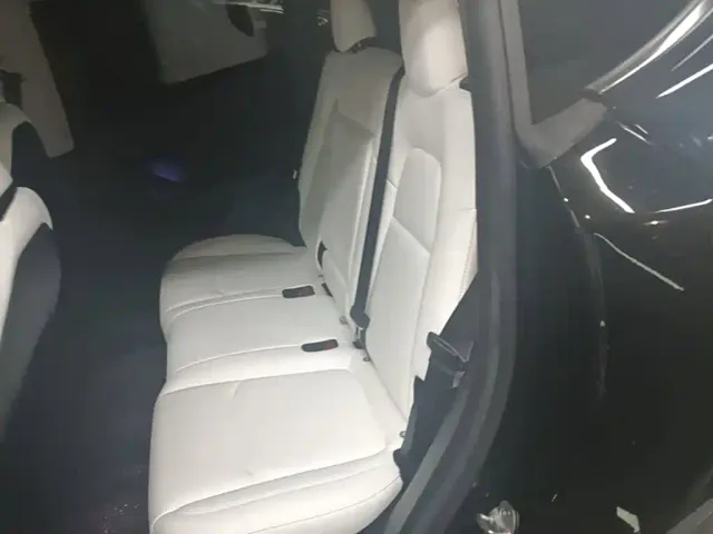 Tesla Model Y — Фото автомобиля 16