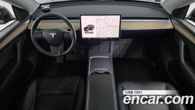 Tesla Model Y — Фото автомобиля 7