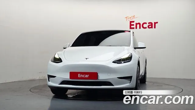 Tesla Model Y — Фото автомобиля 3