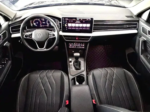 Volkswagen Tiguan L — Фото автомобиля 6