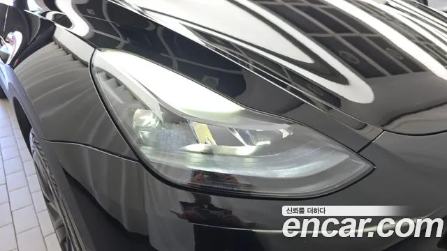Tesla Model Y — Фото автомобиля 7