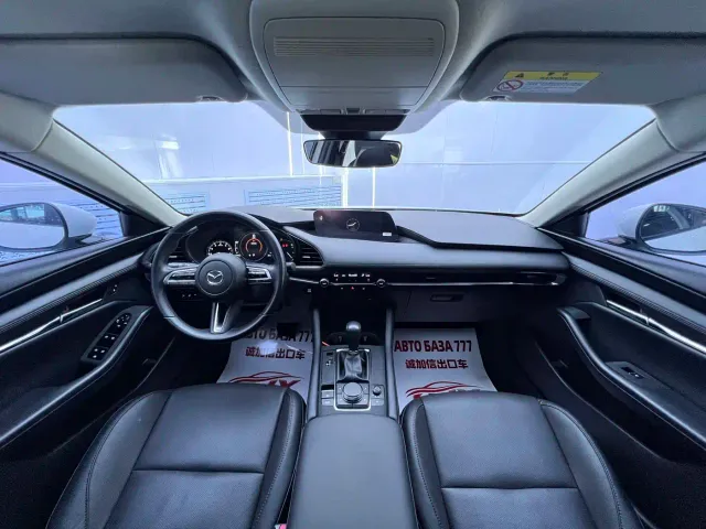 Mazda Axela — Фото автомобиля 18