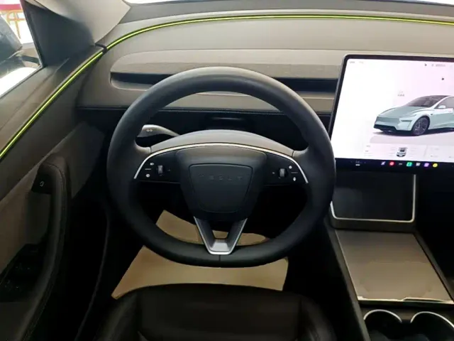 Tesla Model Y — Фото автомобиля 10