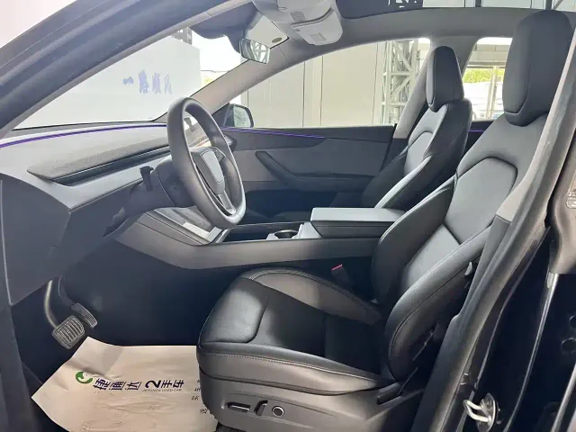 Tesla Model Y — Фото автомобиля 5