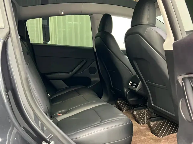 Tesla Model Y — Фото автомобиля 7