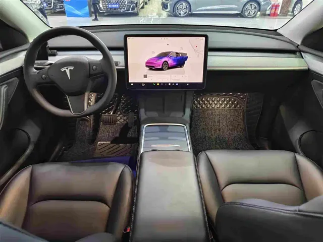 Tesla Model Y — Фото автомобиля 6