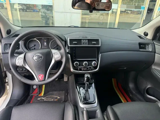 Nissan Tiida — Фото автомобиля 7