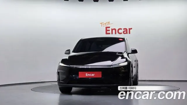 Tesla Model Y — Фото автомобиля 3