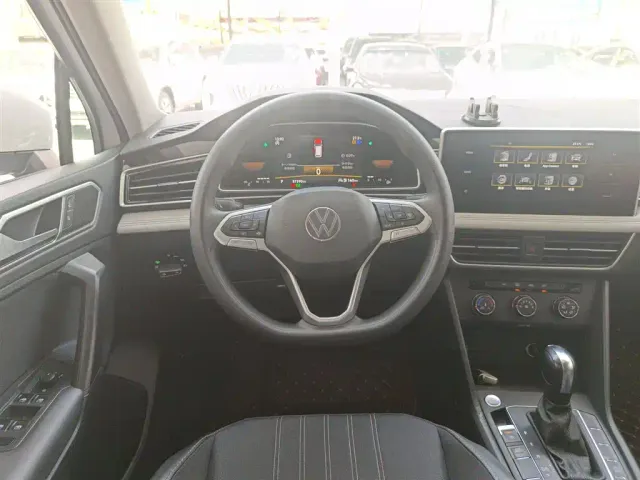Volkswagen Tiguan L — Фото автомобиля 6