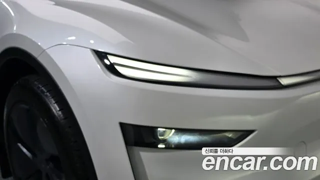 Tesla Model Y — Фото автомобиля 7
