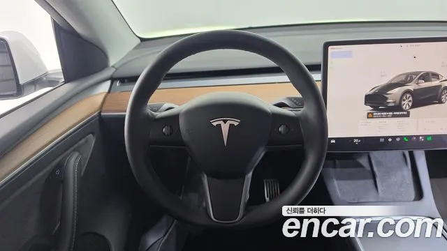 Tesla Model Y — Фото автомобиля 14