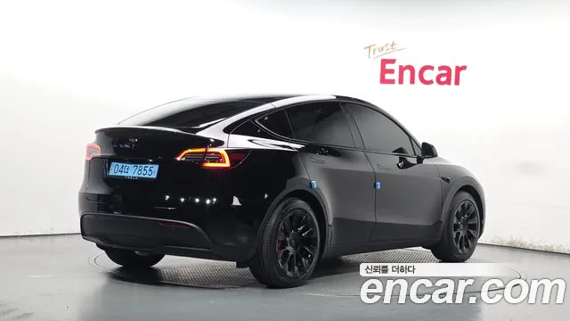 Tesla Model Y — Фото автомобиля 2