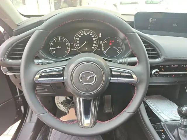 Mazda Axela — Фото автомобиля 10
