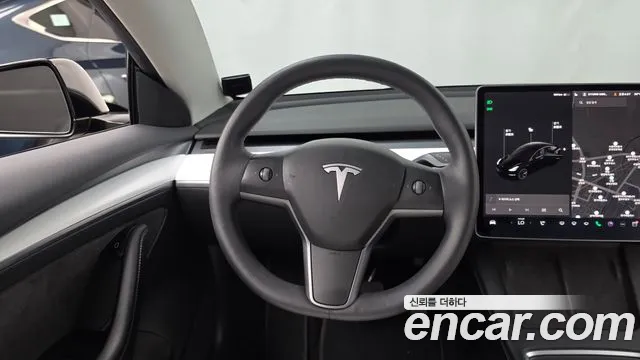 Tesla Model 3 — Фото автомобиля 13