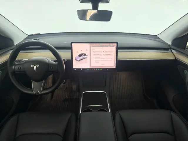 Tesla Model Y — Фото автомобиля 7
