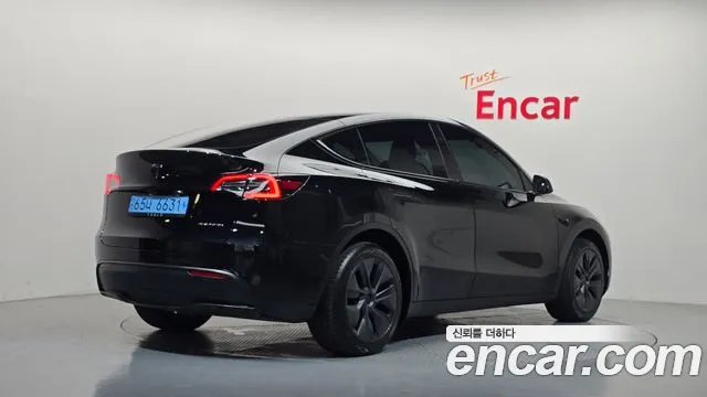 Tesla Model Y — Фото автомобиля 2