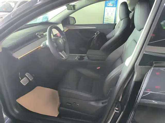 Tesla Model Y — Фото автомобиля 14