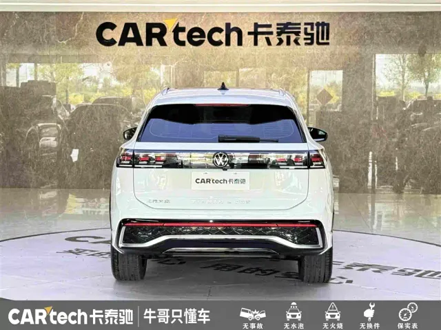 Volkswagen Tiguan L — Фото автомобиля 5
