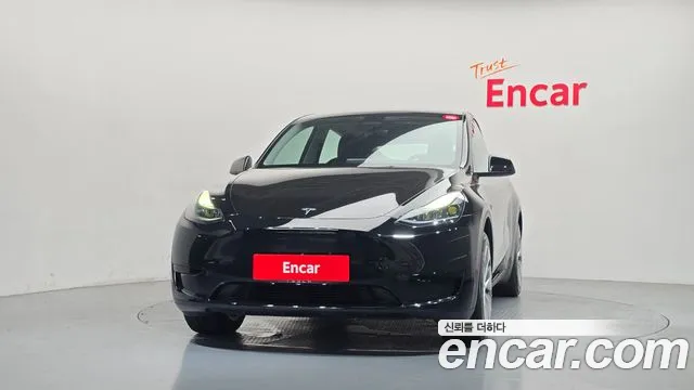 Tesla Model Y — Фото автомобиля 3