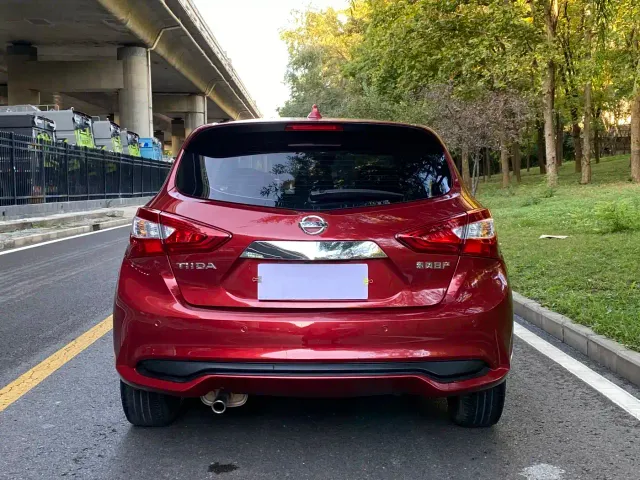 Nissan Tiida — Фото автомобиля 15