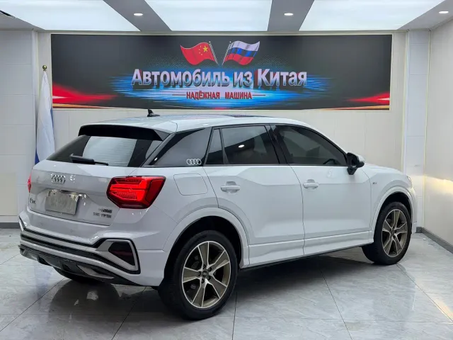 Audi Q2L — Фото автомобиля 4