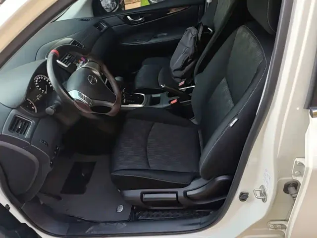 Nissan Tiida — Фото автомобиля 14