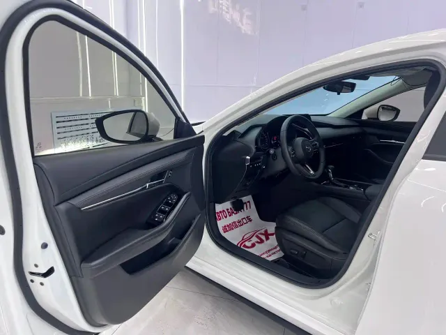 Mazda Axela — Фото автомобиля 7