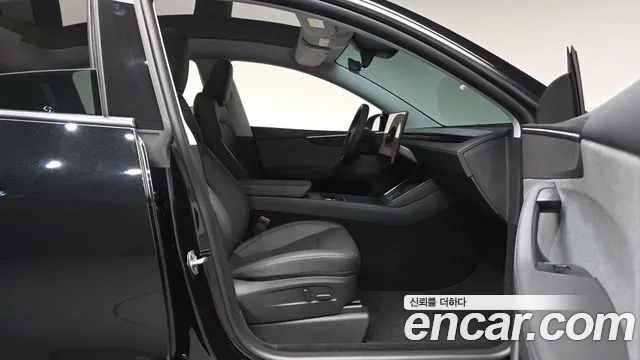 Tesla Model Y — Фото автомобиля 23