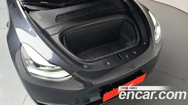 Tesla Model Y — Фото автомобиля 9