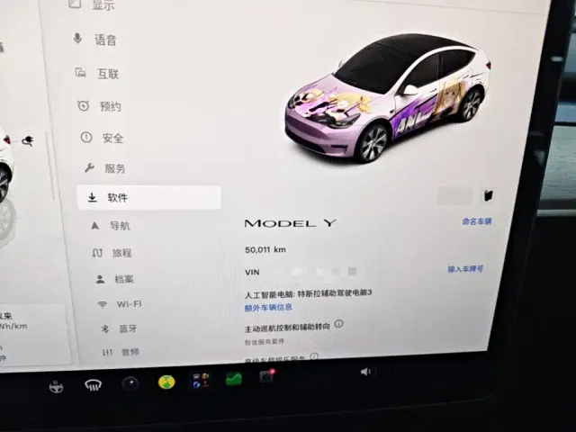 Tesla Model Y — Фото автомобиля 11