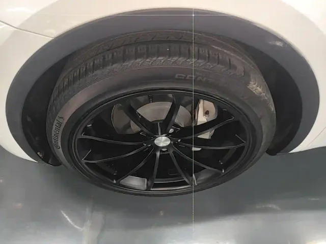 Tesla Model Y — Фото автомобиля 22