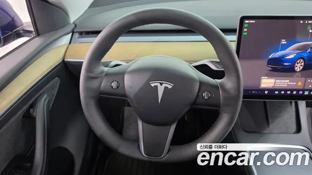 Tesla Model Y — Фото автомобиля 20