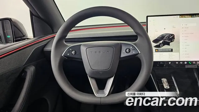 Tesla Model Y — Фото автомобиля 13