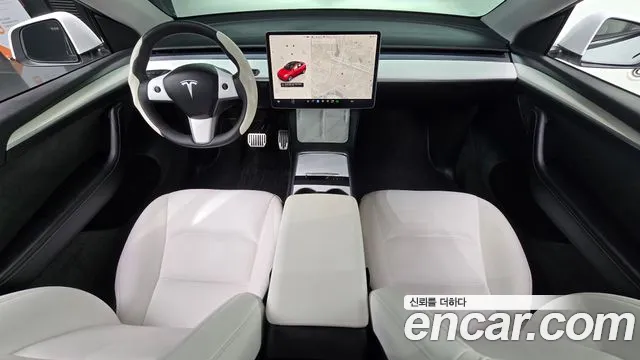 Tesla Model Y — Фото автомобиля 6