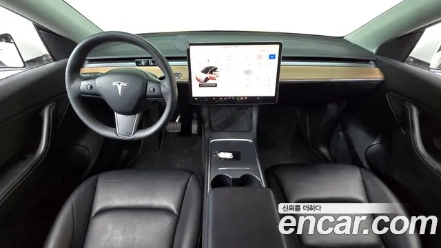 Tesla Model Y — Фото автомобиля 4