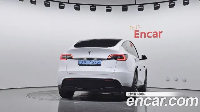 Tesla Model Y — Фото автомобиля 4