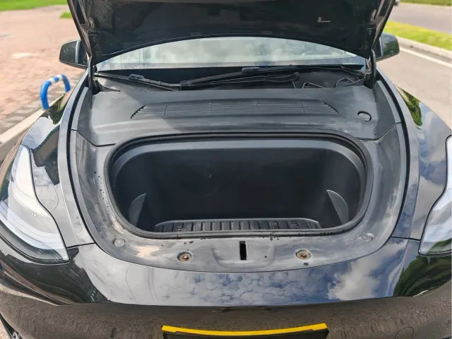 Tesla Model Y — Фото автомобиля 23