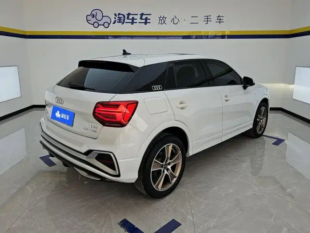 Audi Q2L — Фото автомобиля 3