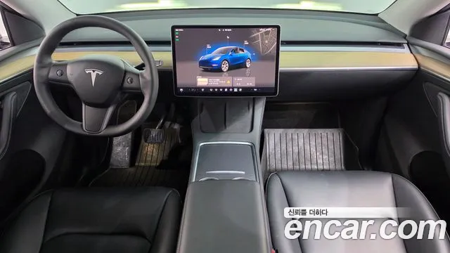 Tesla Model Y — Фото автомобиля 10