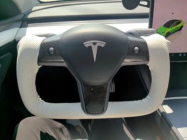 Tesla Model Y — Фото автомобиля 10