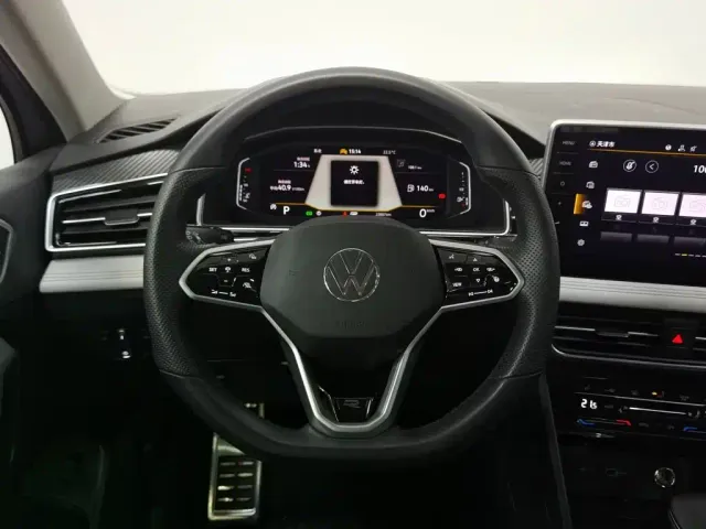 Volkswagen Tiguan L — Фото автомобиля 14