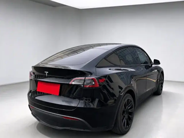 Tesla Model Y — Фото автомобиля 6